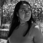 Elegant black and white portrait of a young woman outdoors in Santiago Zautla, Mexico.